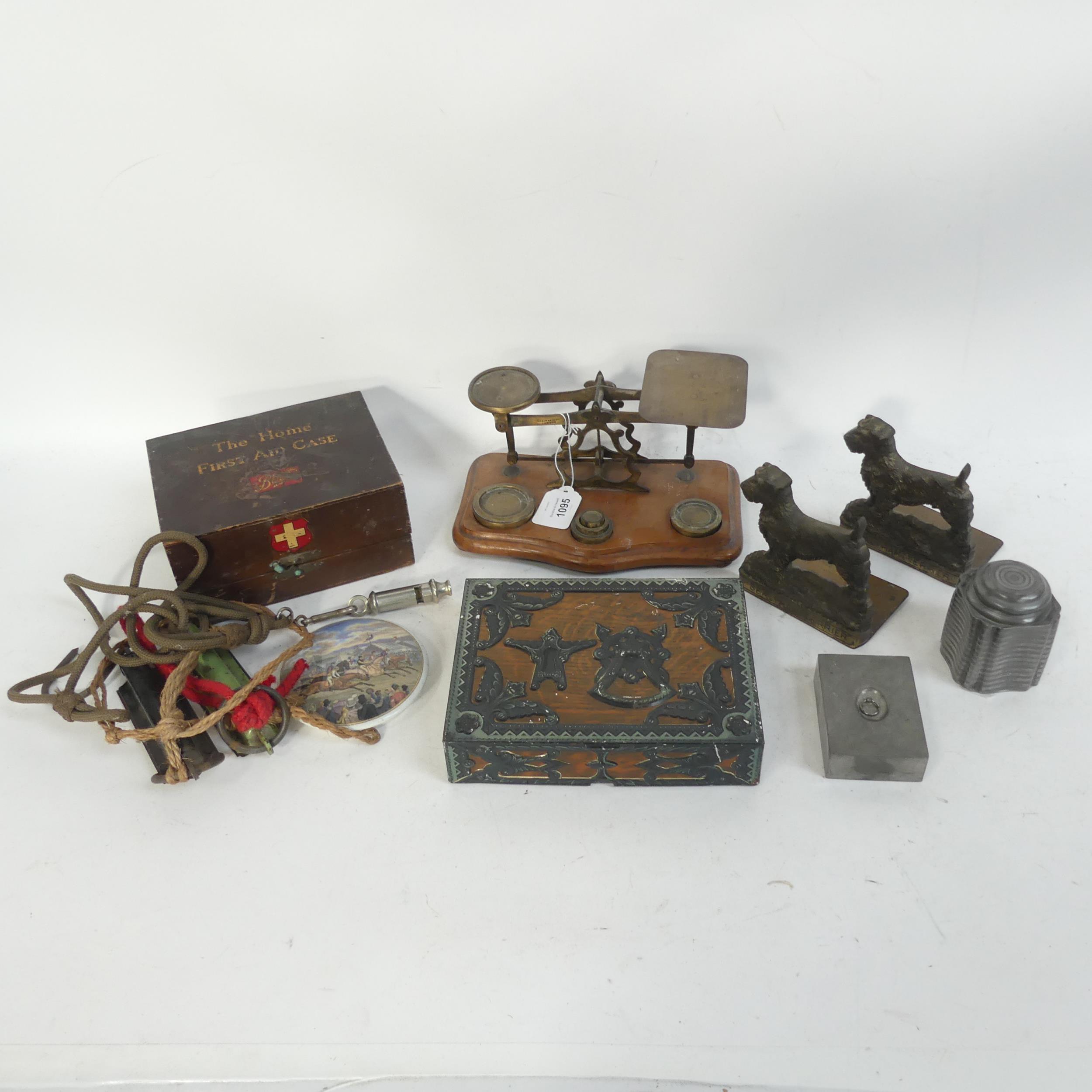 2 Salter's spring scales, a whistle, a pair of brass Terrier bookends, biscuit tin, pot lid