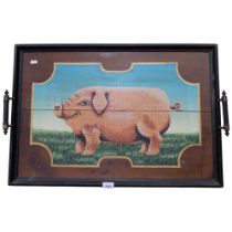 A wooden tea tray with painted design of a pig, L72cm