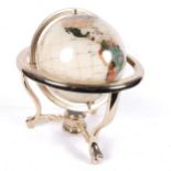 A Meridian Collection table-top terrestrial globe, with abalone shell decoration, H33cm, boxed
