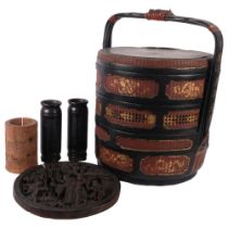 A Chinese lacquered drum-shaped food container, H40cm, and 4 other carved pieces