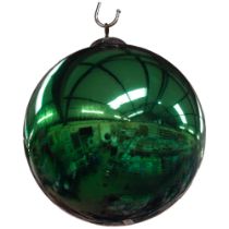 A Vintage green witch's ball, 23cm across approx