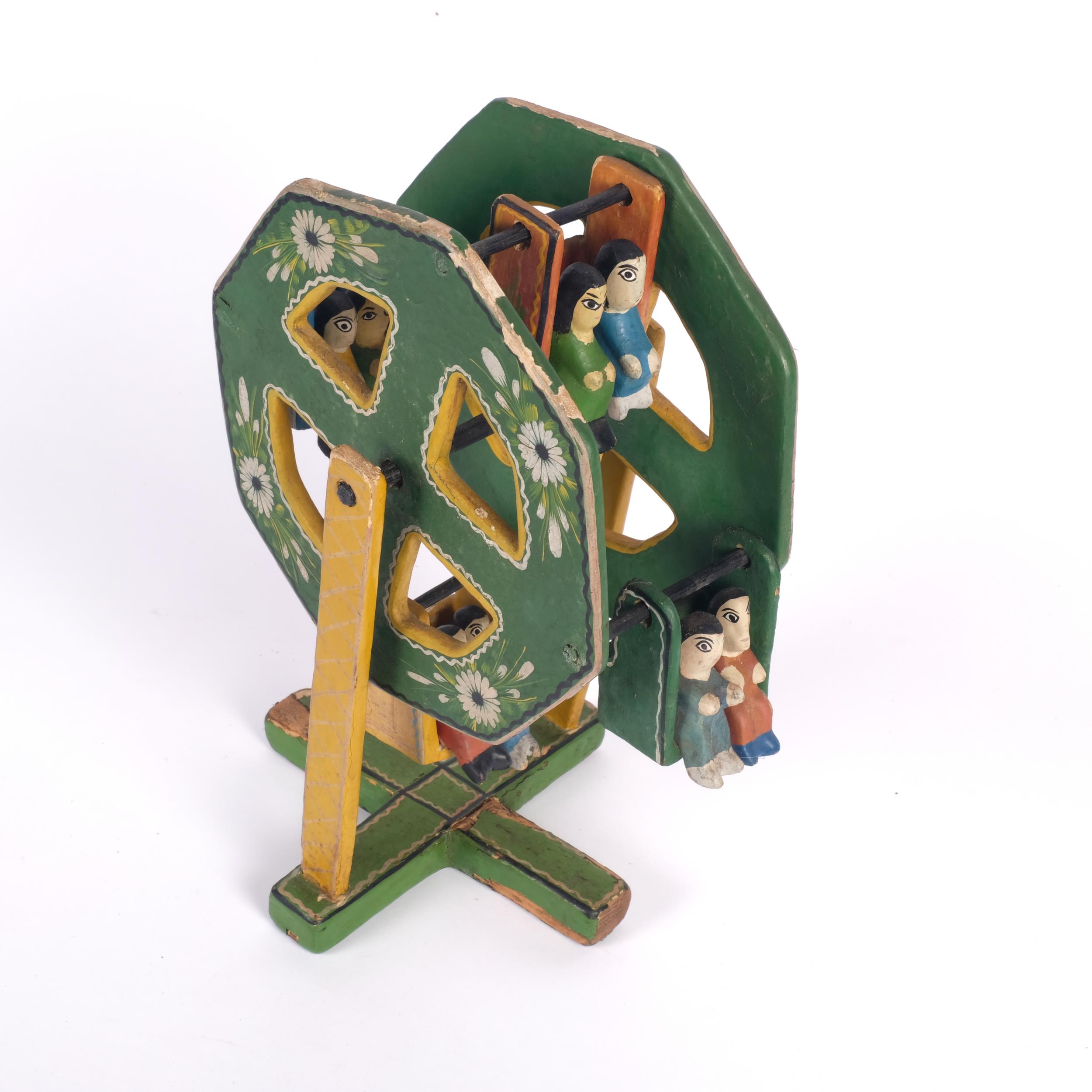 An unusual Mexican Folk Art painted ferris wheel, complete with 4 swing seats and figures, H31cm - Image 2 of 2