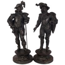 A pair of patinated spelter cavaliers on plinths, 47cm