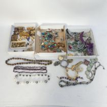 A collection of vintage and other costume jewellery, to include a 9ct gold front and back locket...