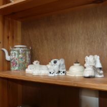 A 19th century Chinese Canton teapot, lacking lid, a pair of 19th century beadwork face screens with