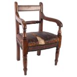 A 19th century child's mahogany elbow chair with studded leather seat
