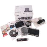 A Canon EOS M, in original box with associated lenses and accessories, ref. EF-M 18-55 IS STM,