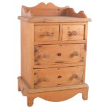 A polished pine table-top chest of 4 short drawers, with a raised gallery and bracket feet, W28cm,
