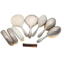9 various engine turned silver-backed dressing table brushes, 2 mirrors and a comb