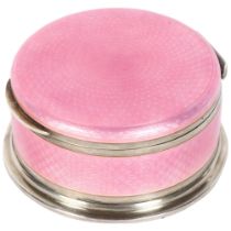 A George VI silver and pink enamel circular box and cover, diameter 62mm, height 29mm approx,