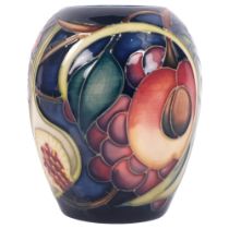 A Moorcroft, 2000, "Queen's Choice" pattern vase, marked to the underside, H10cm, in original box