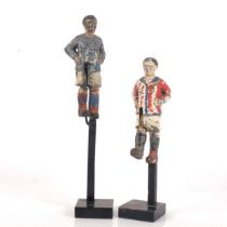 2 Vintage painted lead footballing figures, with hinged leg, mounted on stands, tallest 19cm