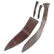 An Indian kukri knife, with steel-bound leather scabbard, L40cm