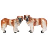 A pair of 19th century Staffordshire St Bernard dog figurines, H24cm (2) The first dog has a crack