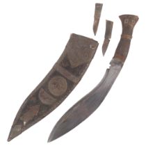 An Indian kukri knife, with steel-bound wooden scabbard, L42cm