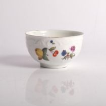 A Meissen tea bowl with hand painted floral decoration, H4cm There is a small chip along the top