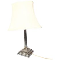 A silver plate on copper Corinthian column table lamp, on stepped plinth base, with shade, height