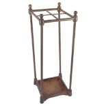 A Victorian 4-section brass-framed stick/umbrella stand, H58cm