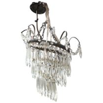 A small crystal and brass cascade chandelier with associated glass lustres, drop approx 42cm