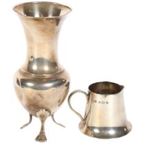 An Edward VII small silver milk jug, and a silver vase on 3 splayed feet, H14cm, 4.9oz weighable