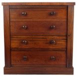 A Regency rosewood table-top Wellington chest, with 4 short graduated drawers and turned wood
