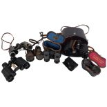 A quantity of Vintage binoculars, including a pair of Husbands Bristol binoculars, in associated