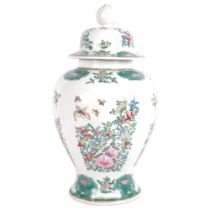 A large Chinese famille vert baluster jar and cover, H47cm Good overall condition, this was