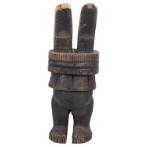 A carved African hardwood Tribal figure, H36cm