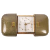 An early 20th century Europa 7 jewel travel alarm clock