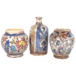 3 Continental faience vases with floral designs, tallest 17cm