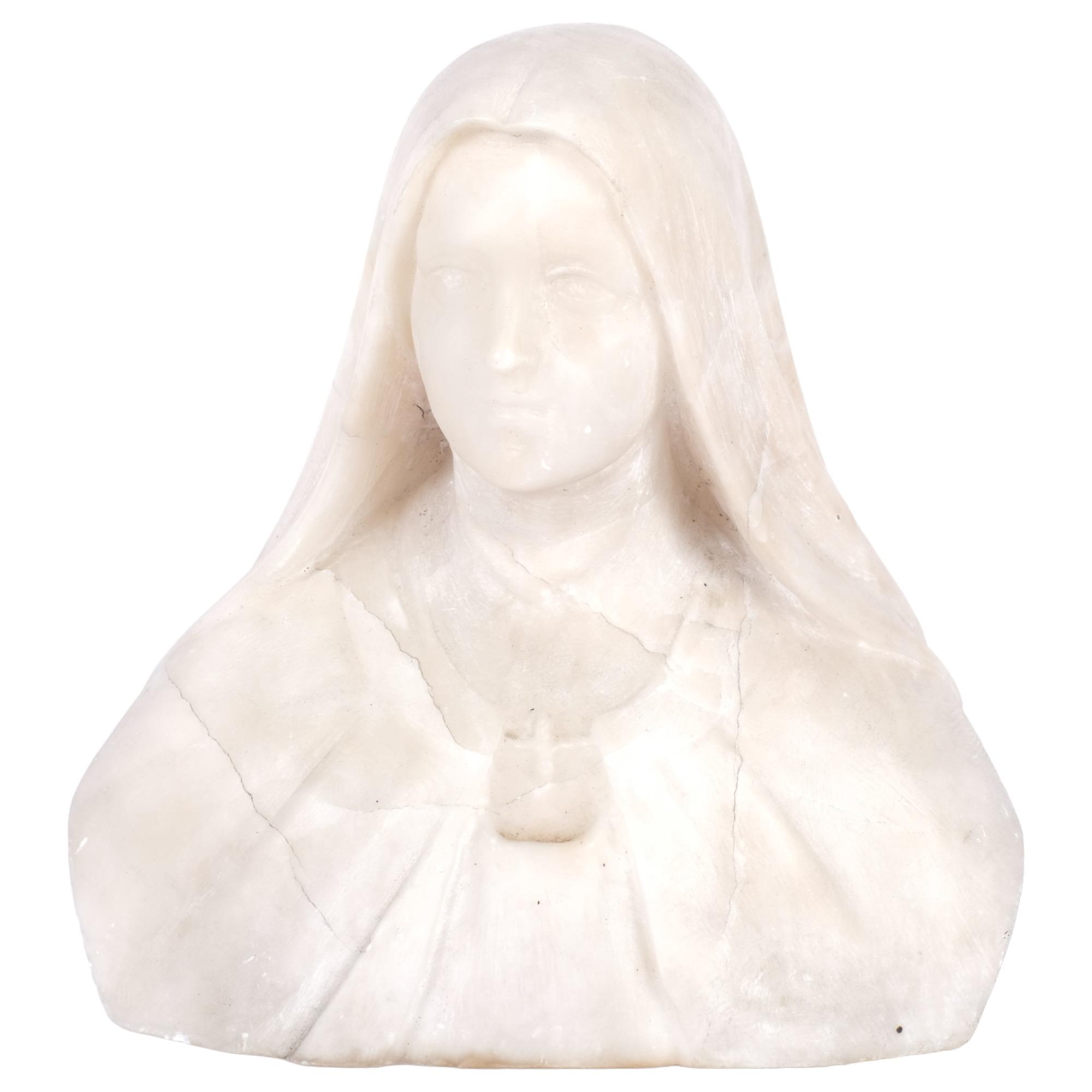 An alabaster bust depicting the Virgin Mary, H27cm