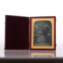 A Victorian ambrotype depicting a couple, original leather case