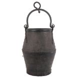 A cast-iron swing-handled cooking pot
