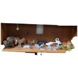 A Beswick study of a buffalo, Beswick donkey, Swarovski animals, a Bossons wall sconce, and other