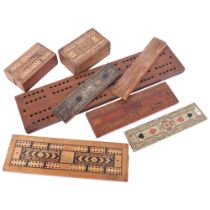 A group of 7 Vintage cribbage boards, largest 46cm long, including 2 boxes with playing cards