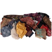 A box of scarves, crochet work, and other textiles