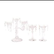 A pair of Bohemian lustre candlesticks, H19.5cm, and a larger glass candelabrum with lustre drops