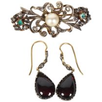 A pair of unmarked gold drop pendant earrings, set with red stone cabochon and diamonds, and an