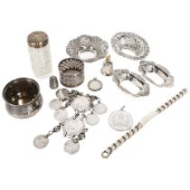 A collection of various silver items, to include a pair of small pierced dishes, small silver pot, a