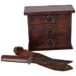 A miniature table-top burr-walnut chest of 3 drawers, with brass drop handles, 16cm across, and a