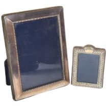 2 modern rectangular silver-fronted photo frames