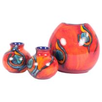 POOLE POTTERY - a Volcano purse vase, H18cm, and 2 similar bud-shaped Poole Pottery vases, both with