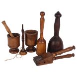 A group of Antique treen items, to include 2 pestles/masher, and 2 mortars, a ball and cup stick (no