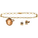 A group of 9ct gold jewellery, including an open link bracelet, a relief carved cameo ring, and a