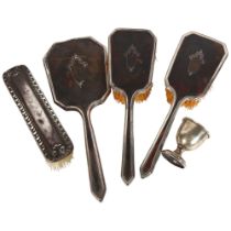 A silver and tortoiseshell 3-piece dressing table brush and mirror set, a silver-backed brush and