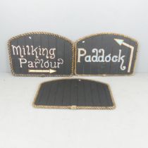 Three various black painted signs with rope surrounds. Largest (Blank) 90x60cm. 1x"milking parlour",