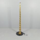 A contemporary gold painted standard lamp of spiral form, on granite base. H - 150cm.