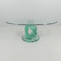 A contemporary oval glass-topped occasional table on stepped spiral base, in the manner of Danny