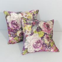 CHRISTIAN LACROIX FOR THE DESIGNERS GUILD - A pair of contemporary cushions, upholstered in Damson