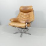 SKOGHAUG INDUSTRI - A 1960s Norwegian leather reclining armchair on tubular swivel base. Maker's